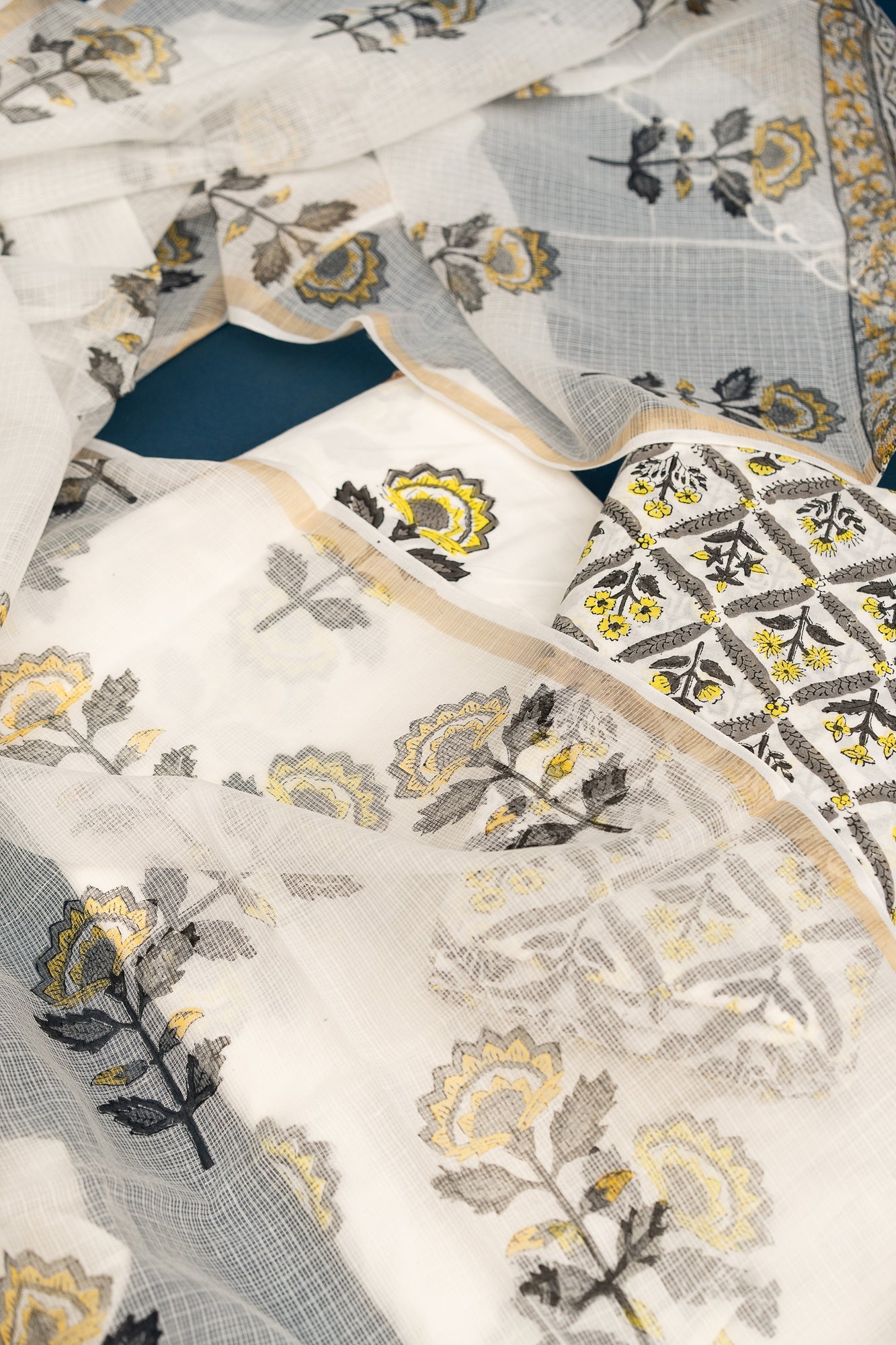 𝗡𝗔𝗥𝗚𝗜𝗦 𝗡𝗢𝗢𝗥 - Unstitched Cotton 60×60 Suit Set with Kota Doria Dupatta (3 Piece Fabric)